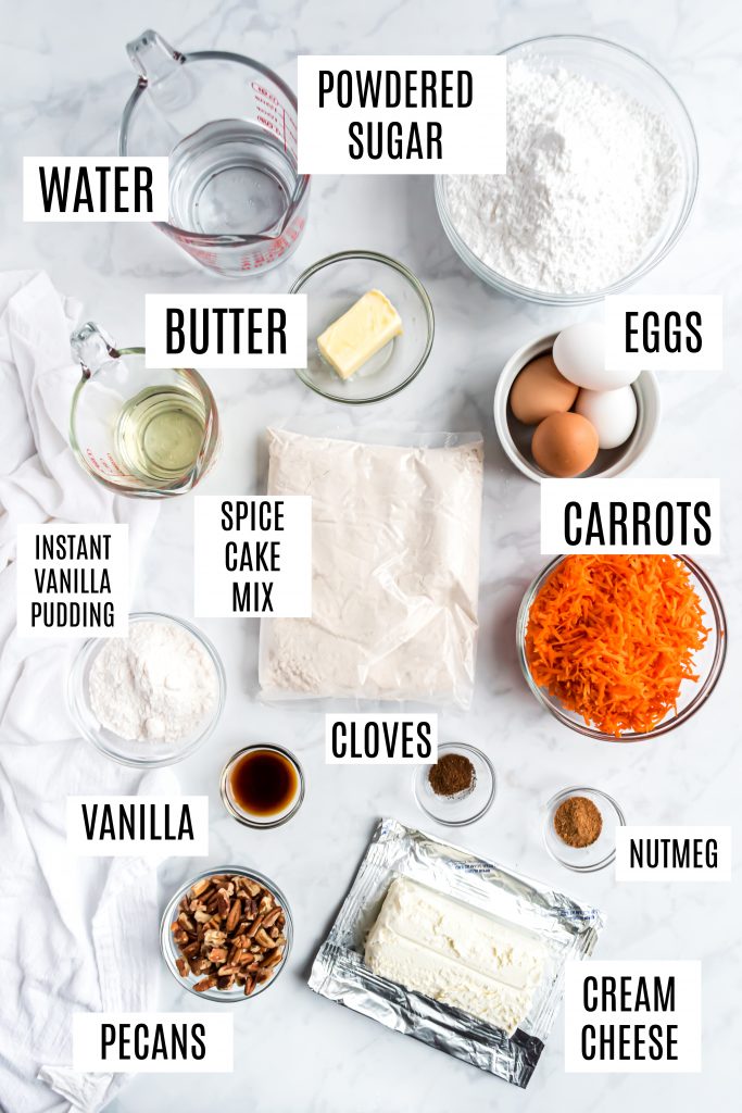 An overhead photo showing all the ingredients needed to make the mini carrot cakes.