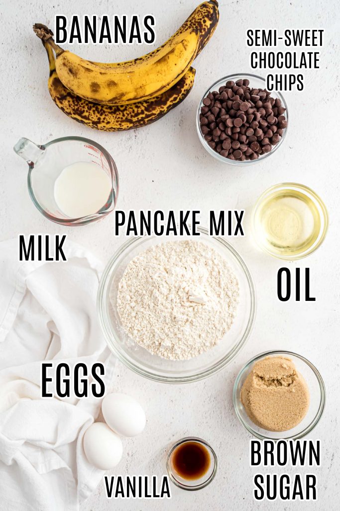 An overhead photo of all the ingredients needs to make this loaf of banana bread with pancake mix