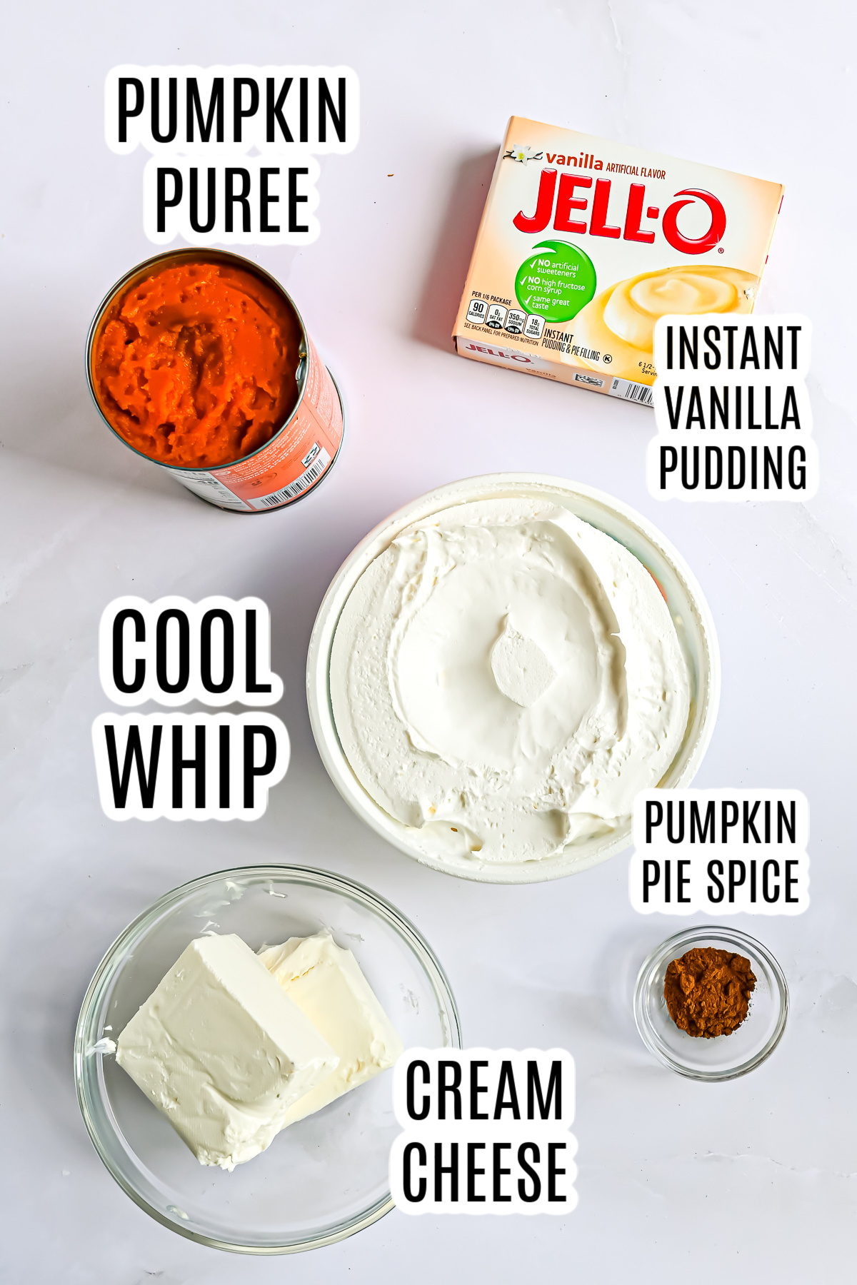 The ingredients needed for how to make pumpkin fluff include pumpkin puree, instant vanilla pudding, cool whip, pumpkin pie spice and cream cheese.