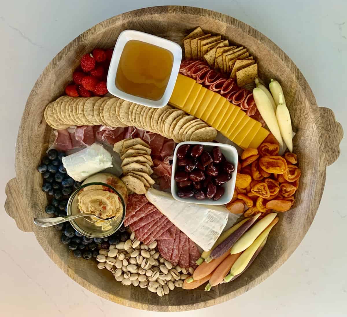 A gluten-free meat and cheese board.