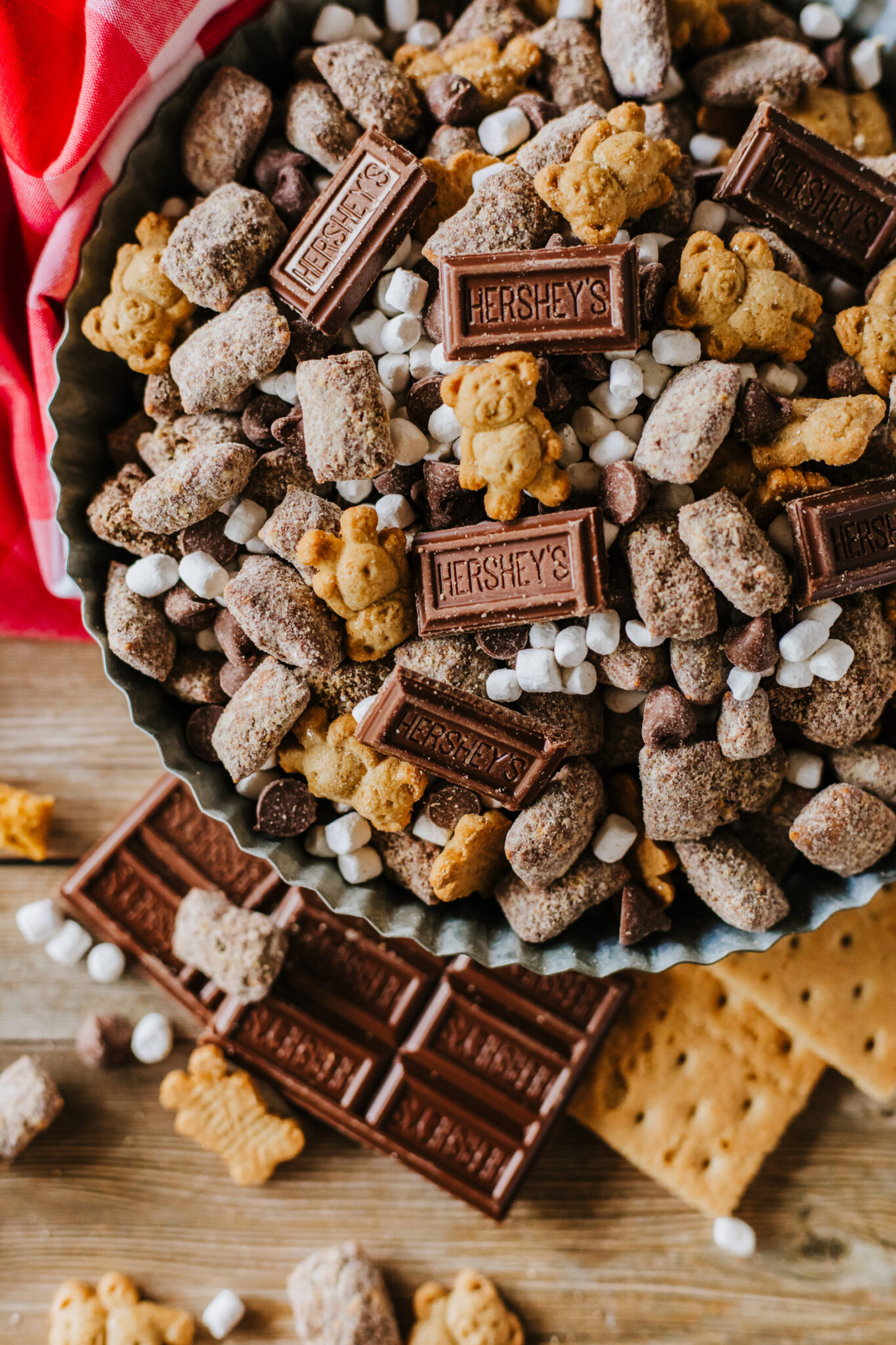 A large tin serving plate filled with S'mores Muddy Buddies.