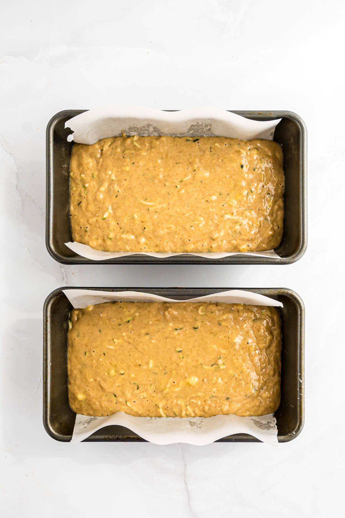 The batter in two loaf pans before baking.