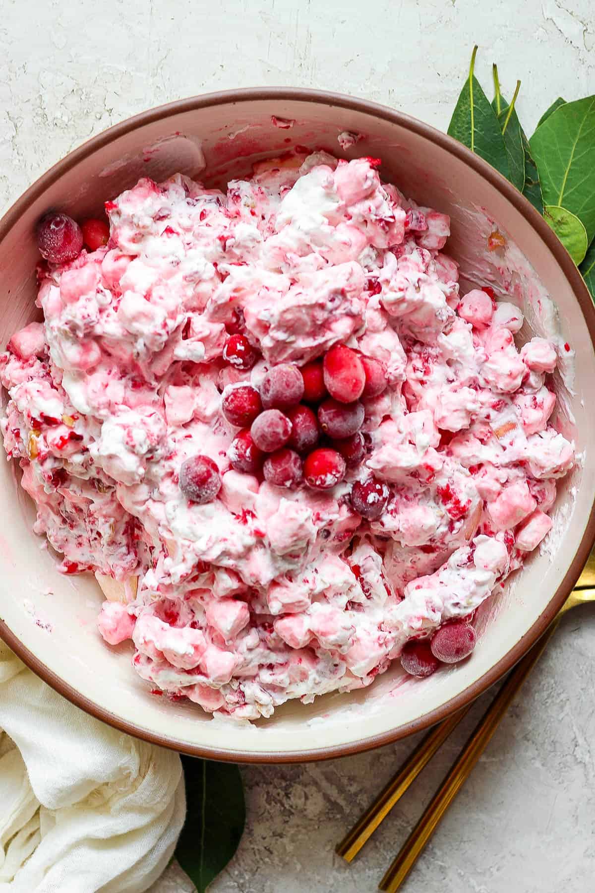 Cranberry fluff salad in a bowl.