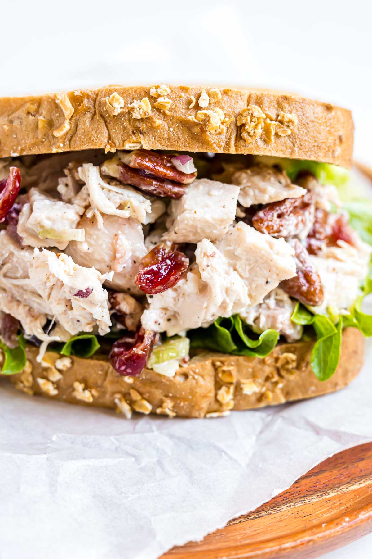 A Cranberry Pecan Chicken Salad sandwich on whole grain bread.