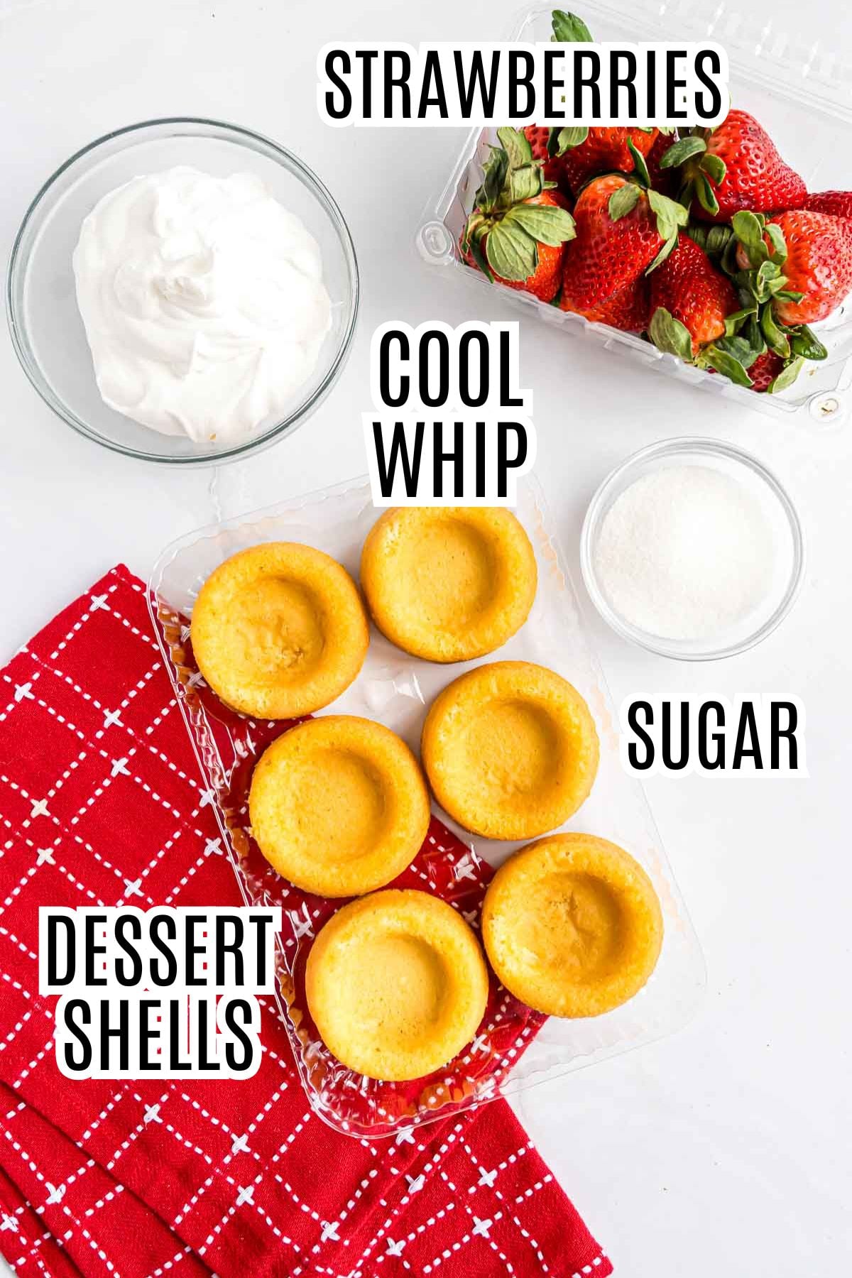 The ingredients needed for the strawberry shortcake dessert includes Cool Whip, fresh strawberries, sugar, and dessert shells.