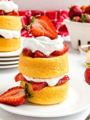 A strawberry shortcake made with fresh strawberries, Cool Whip, and dessert shells.