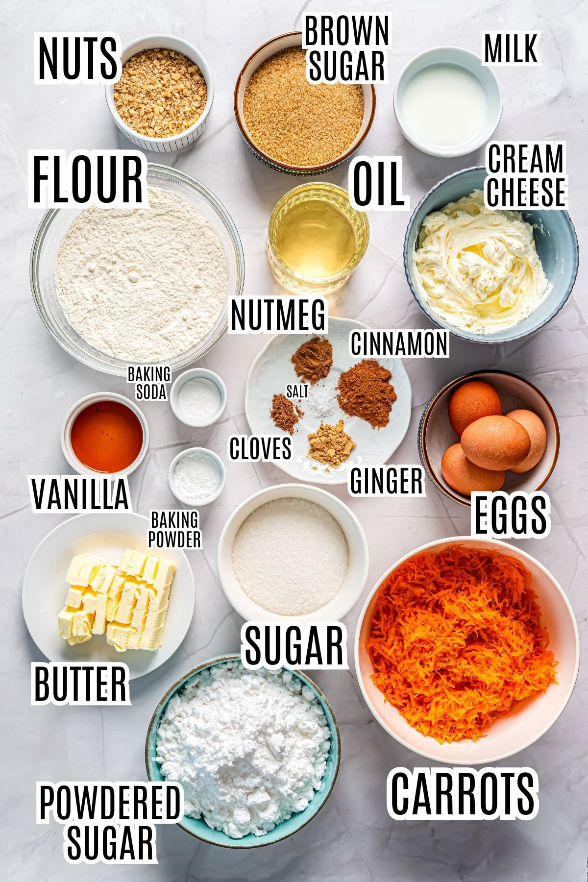 The ingredients needed to make the carrot cake include flour, oil, nuts, brown sugar, milk, cream cheese, nutmeg, cinnamon, salt, cloves, ginger, baking soda, baking powder, vanilla, eggs, shredded carrots, sugar, butter and powdered sugar.