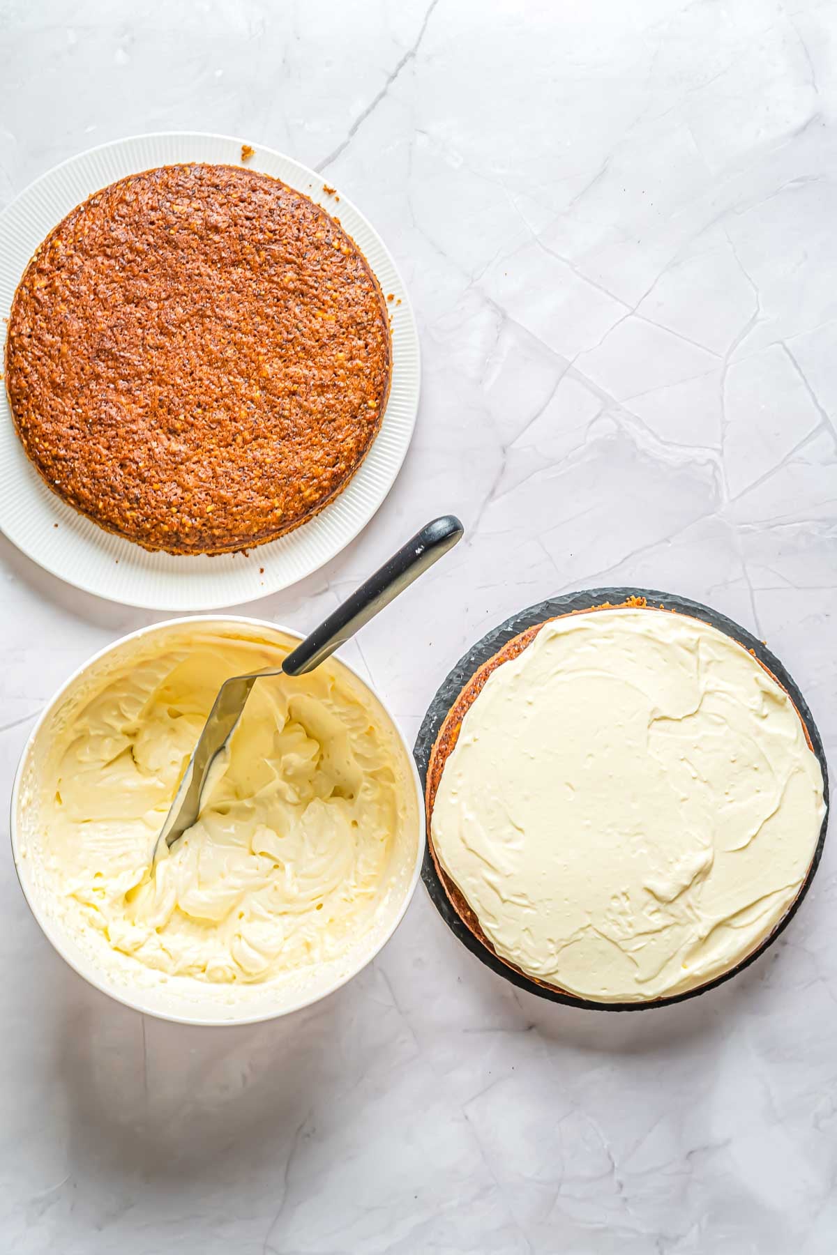 The baked carrot cakes ready to be frosted.