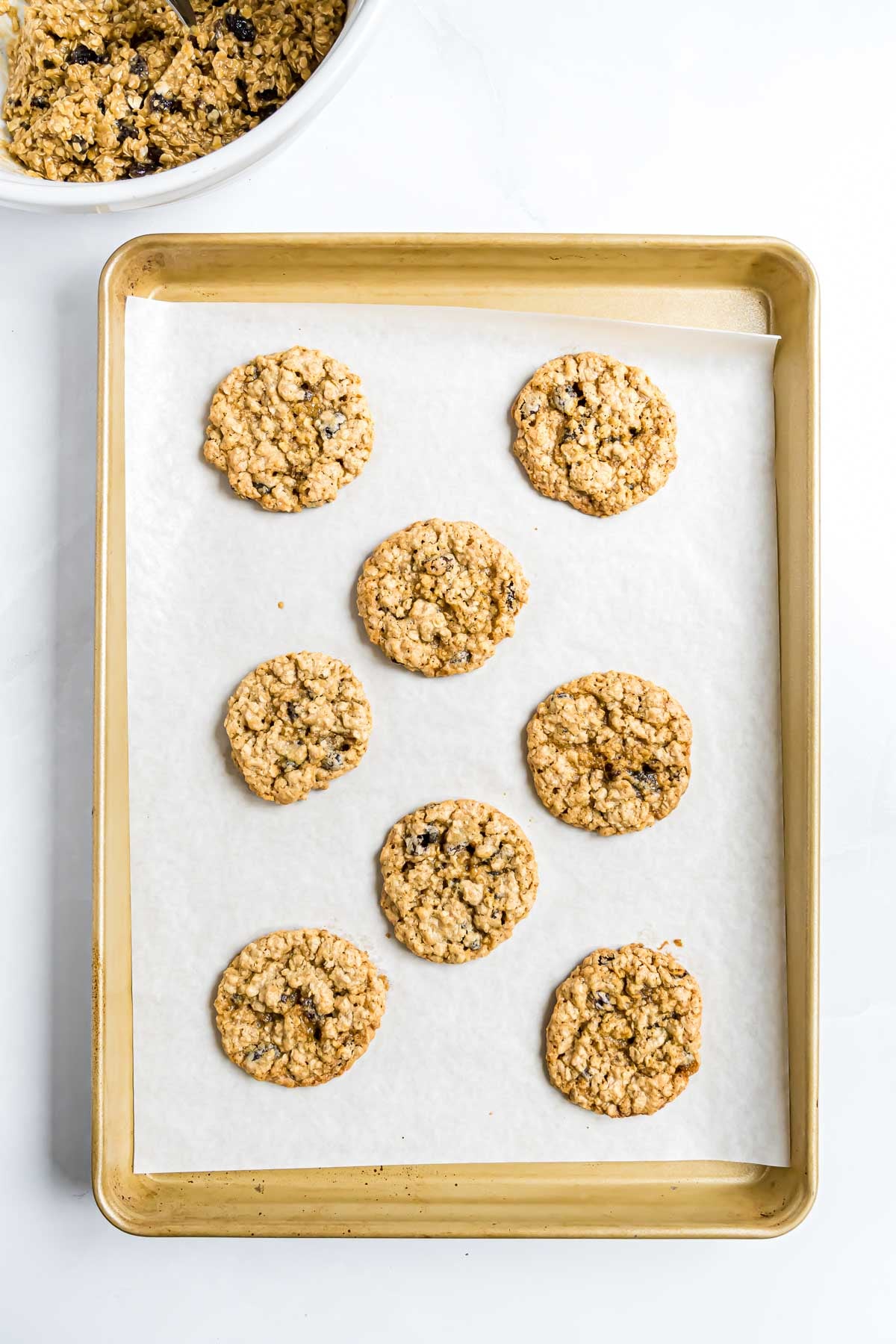 Oatmeal raisin cookies that have been freshly baked.