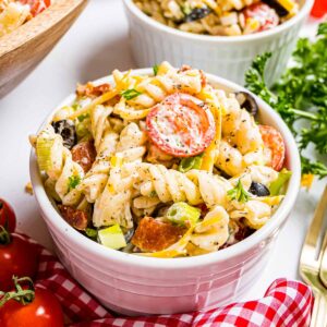 A serving of Bacon Ranch Pasta Salad in a small white ramekin.