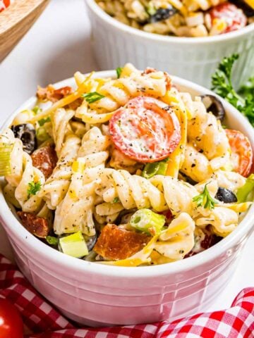 A serving of Bacon Ranch Pasta Salad in a small white ramekin.